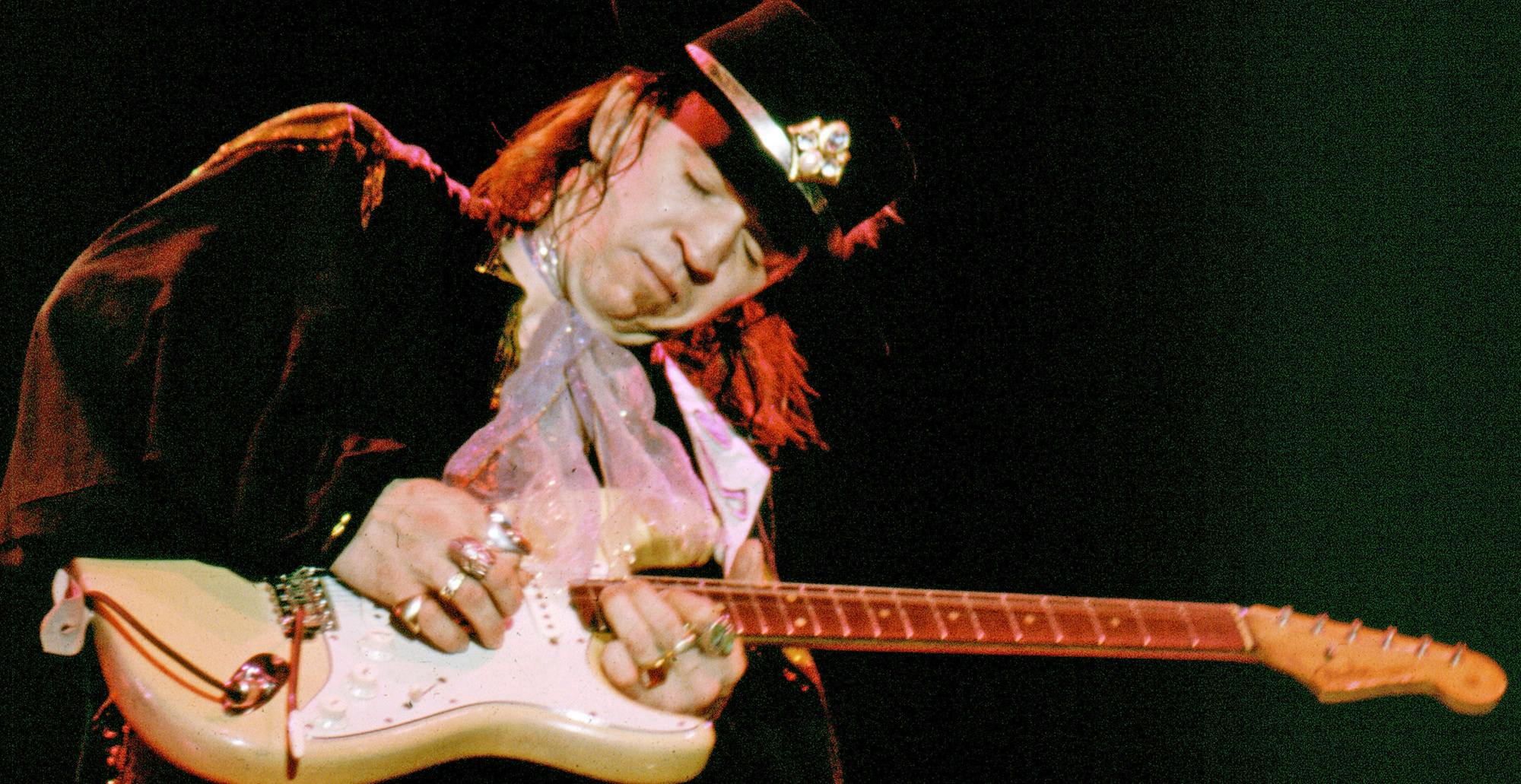 stevie ray vaughan playing guitar