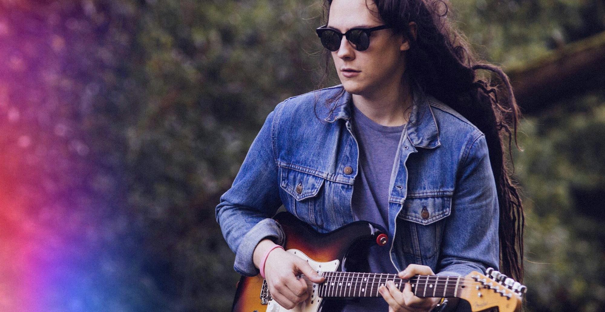 Chris Buck playing the guitar.