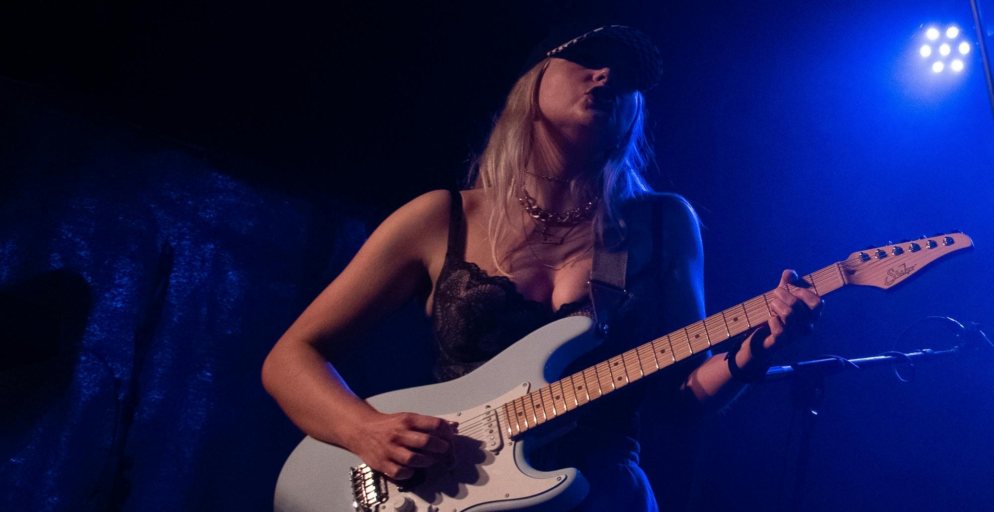 Sofie playing guitar